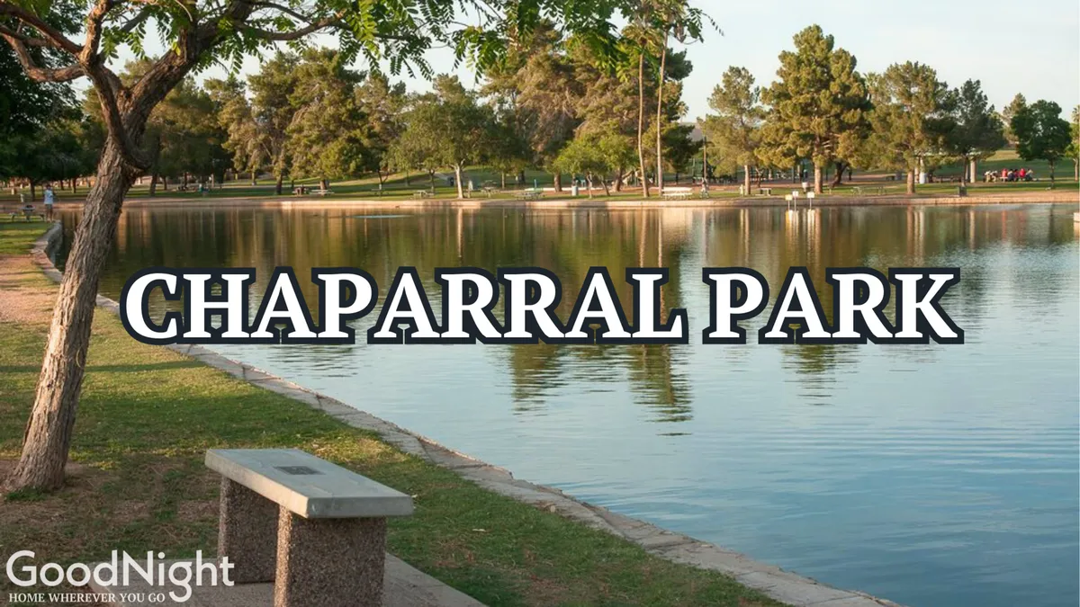 This exterior image captures a serene lakeside park with benches, walking paths, and lush trees, ideal for family picnics or playtime. The tranquil setting hints at the nearby Chaparral Park mentioned in the section, conveying a sense of accessible outdoor fun for all ages.